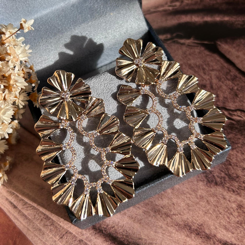 Brinco Letícia Dourado