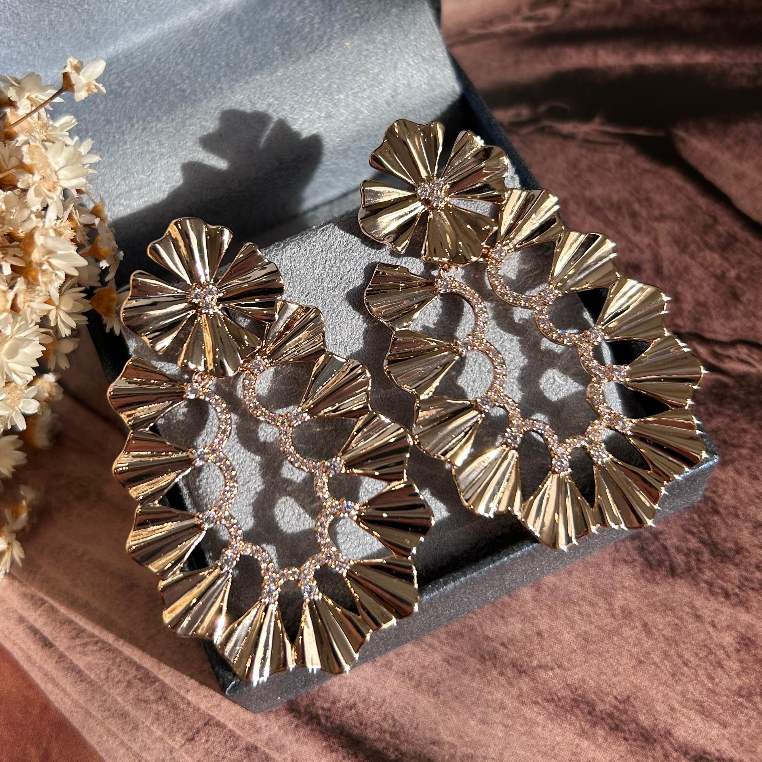 Brinco Letícia Dourado